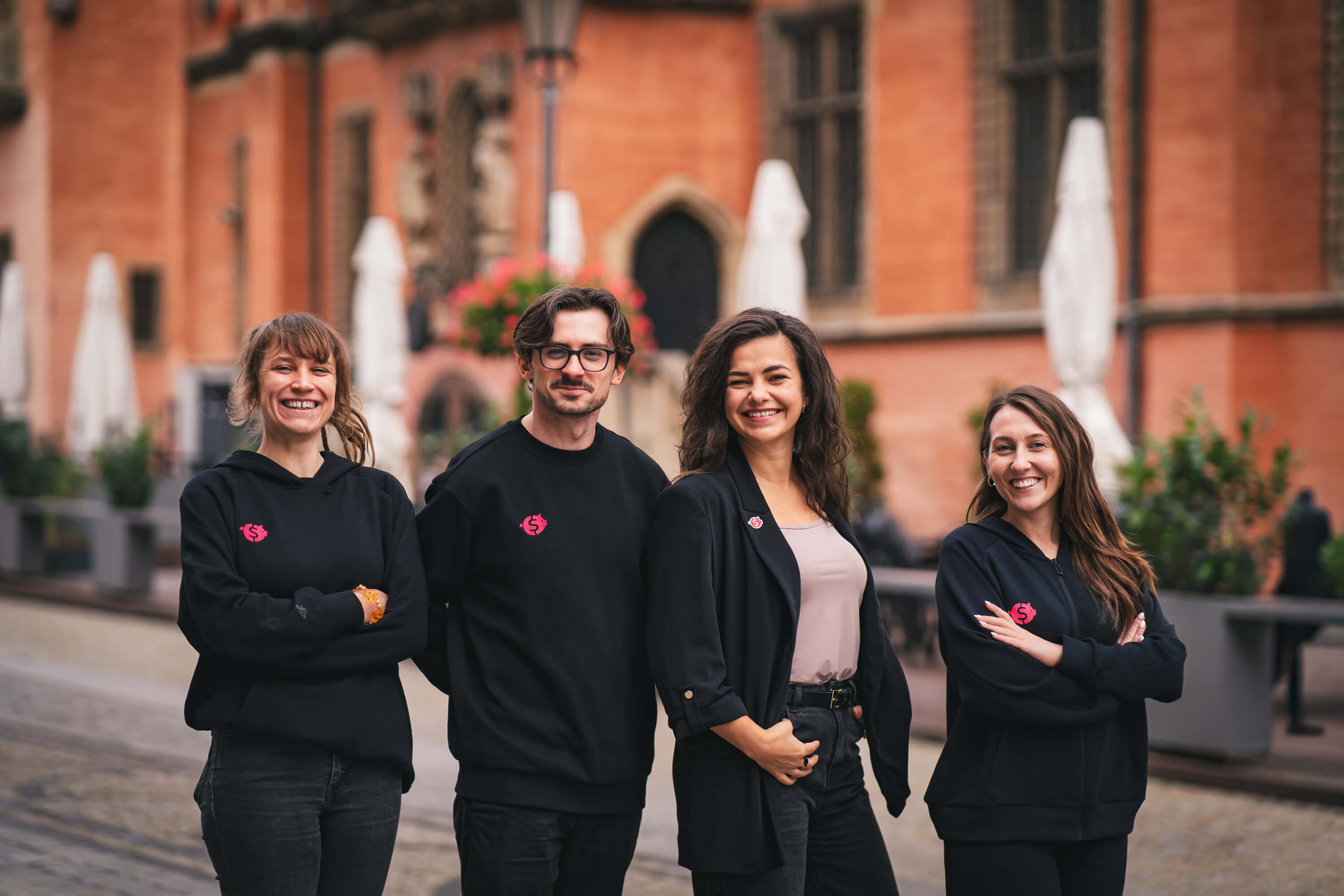4fund.com team members standing together in front of a building